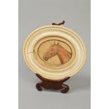 FOLLOWER OF SIR EDWIN LANDSEER, portrait of a brown horse's head in side profile, paper torn and