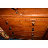 A 20TH CENTURY STAINED PINE CHEST OF TWO SHORT AND THREE LONG DRAWERS, width 105cm x depth 46cm x