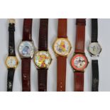 SIX WRISTWATCHES to include watches with faces depicting Winnie the Pooh, Tigger, Eeyore, Cruella De