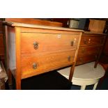 TWO SIMILAR OAK CHEST OF DRAWERS