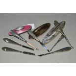 A BAG OF SILVER MOUNTED AND HANDLED MANICURE ITEMS, including a nail buffer with pink enamel