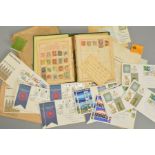 AN OLD TIME STUCK DOWN COLLECTION OF STAMPS, in an album and loose with China large Dragons, used,