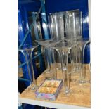 EIGHT LARGE GLASS VASES, possibly table centres for weddings, to include set six, height 43.5 and