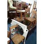 A SET OF FOUR EARLY 20TH CENTURY ELM BAR BACK CHAIRS