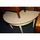 A 19TH CENTURY PAINTED PINE DEMI LUNE TABLE with a formica top, width 139cm x depth 71cm x height