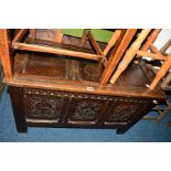 AN OAK TRIPLE PANEL BLANKET CHEST