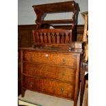 AN OAK CHEST OF THREE LONG DRAWERS and an oak magazine rack (2)