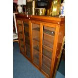 A MID 20TH CENTURY OAK GLAZED FOUR DOOR BOOKCASE with adjustable shelves, width 159cm x depth 28cm x