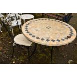 A CIRCULAR MARBLE TOPPED GARDEN TABLE with geometric inset decoration on a composite substrate on an