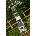 A SET OF DOUBLE EXTENSION ALUMINIUM LADDERS together with two sets of step ladders (3)