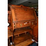 A NARROW OAK FALL FRONT BUREAU