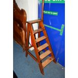 AN EARLY 20TH CENTURY STAINED PINE LIBRARY STEP, together with two smaller library steps (3)
