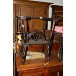 AN EDWARDIAN STAINED OAK OCCASIONAL TABLE