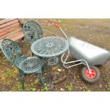 A GREEN PAINTED ALUMINIUM CIRCULAR GARDEN TABLE with floral design, diameter 60cm x height 62cm