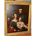 A MID VICTORIAN SCHOOL, HALF LENGTH SEATED PORTRAIT OF A GENTLEMAN, his wife and their daughter