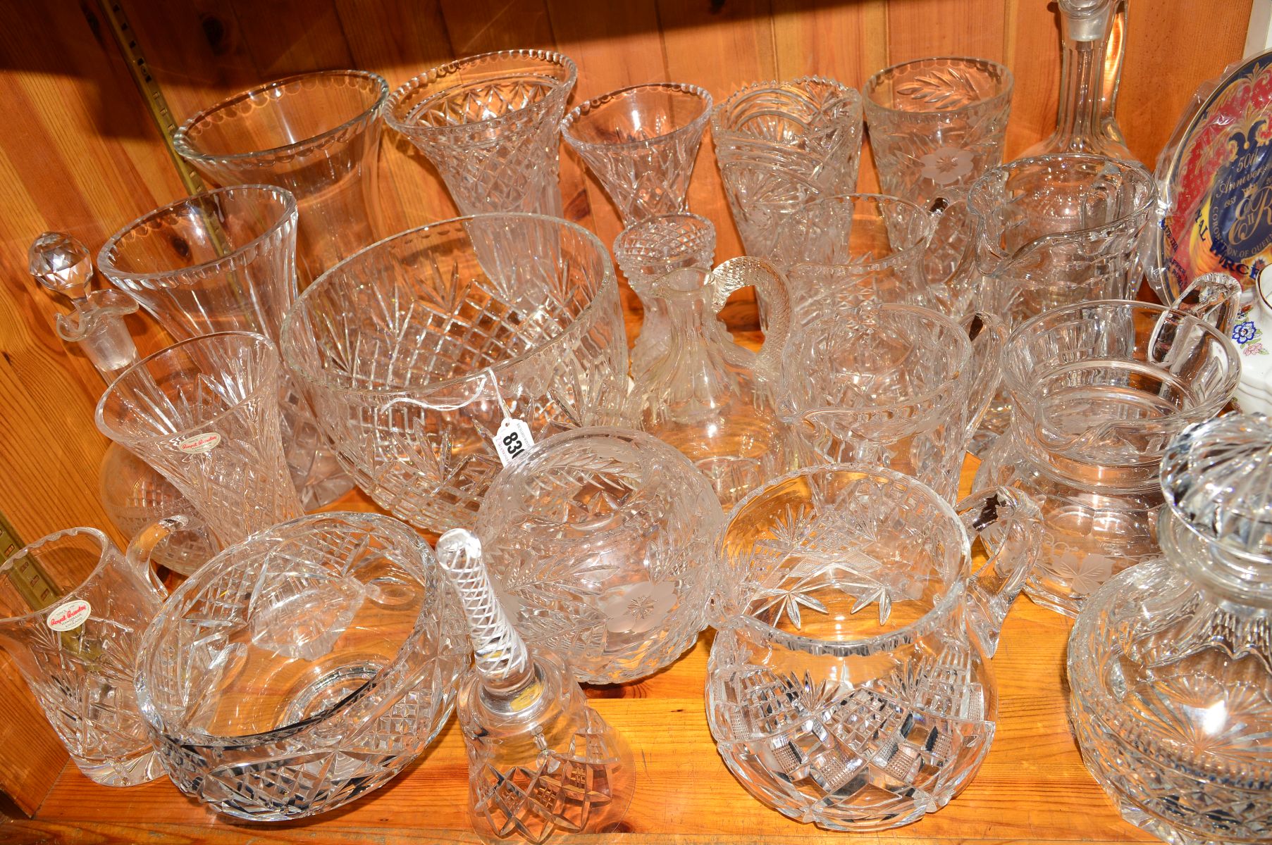 A QUANTITY OF CUT GLASS to include Royal Brierley, Stuart Crystal etc, vases, decanters, jugs, etc