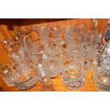 A QUANTITY OF CUT GLASS to include Royal Brierley, Stuart Crystal etc, vases, decanters, jugs, etc