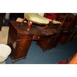 A PAIR OF REGENCY MAHOGANY SIDEBOARDS, having raised back and sides, central D front drawer
