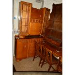 AN OAK ART DECO DRAW LEAF TABLE, four chairs, matching sideboard with five drawers and a bureau/