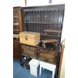 AN OAK BARLEY TWIST DRESSER, with double geometric panelled doors, width 121cm x depth 46cm x height