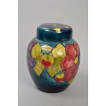 A MOORCROFT POTTERY GINGER JAR, 'Clematis' pattern on dark to light blue ground, impressed marks and