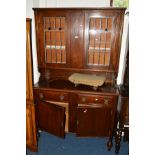 AN OAK LEAD GLAZED DRESSER with two drawers, width 122cm x depth 45.5cm x height 194cm