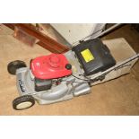 A HONDA HRB 476C PETROL SELF PROPELLED REAR ROLLER LAWN MOWER with grass box