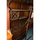 AN OAK DRESSER with three short drawers, width 137cm