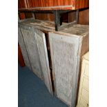 A DISTRESSED 19TH CENTURY PAINTED PINE FOUR DOOR CUPBOARD, with mesh doors, revealing four shelves