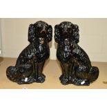 A PAIR OF STAFFORDSHIRE 'JACKFIELD' SEATED DOGS, approximate height 39cm (2)