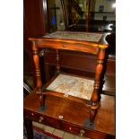 THEODORE ALEXANDER, a mahogany veined marble two tier side table having a brushing slide with a