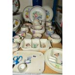 A QUANTITY OF POOLE POTTERY, CIRCA 1930'S ONWARDS, to include plates, posy vases, preserve pots, and