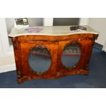 A MID VICTORIAN BURR WALNUT SERPENTINE CREDENZA, veined white marble top above mirrored double