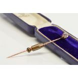 A DIAMOND STICK PIN, estimated transitional cut weight 0.60ct, colour assessed as H-I, clarity I1,