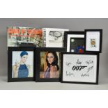 A QUANTITY OF JAMES BOND MEMORABILIA, signed photographs and small props from the films, etc, some