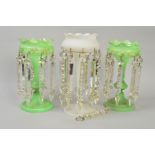 A PAIR OF GREEN GLASS LUSTRES, with cut glass droppers (one loose), height 27cm, together with an