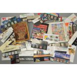 A COLLECTION OF STAMPS, in two stockbooks, an album and loose with Great British Decimal