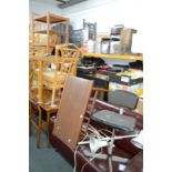 A DANISH STYLE TEAK THREE TIER TEA TROLLEY, a teak coffee table, an industrial swivel stool and