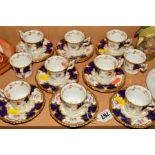 COALPORT DEMITASSE CUPS AND SAUCERS, batwing colbalt pattern and AD2665 to base, comprising ten cups