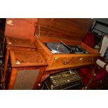 A REPRODUCTION WALNUT CASED GARRARD 35SB TURNTABLE on cabriole legs and a pair of cased speakers (