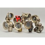 A COLLECTION OF EARLY 20TH CENTURY CARBIDE MOTORCYCLE OR BICYCLE LAMPS, to include examples of