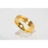 A MODERN 18CT YELLOW GOLD WEDDING RING, flat cross section measuring approximately 6.0mm in width,