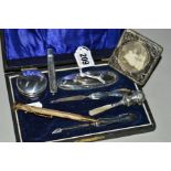 A CASED GEORGE V SILVER MOUNTED MANICURE SET, lacks scissors, Birmingham 1917/18, together with a