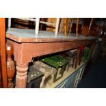 AN EARLY VICTORIAN STAINED PINE HALL TABLE with a later formica top on four octagonal shaped legs,