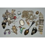 A SELECTION OF SILVER AND WHITE METAL JEWELLERY, to include a charm bracelet, a pair of Mexican
