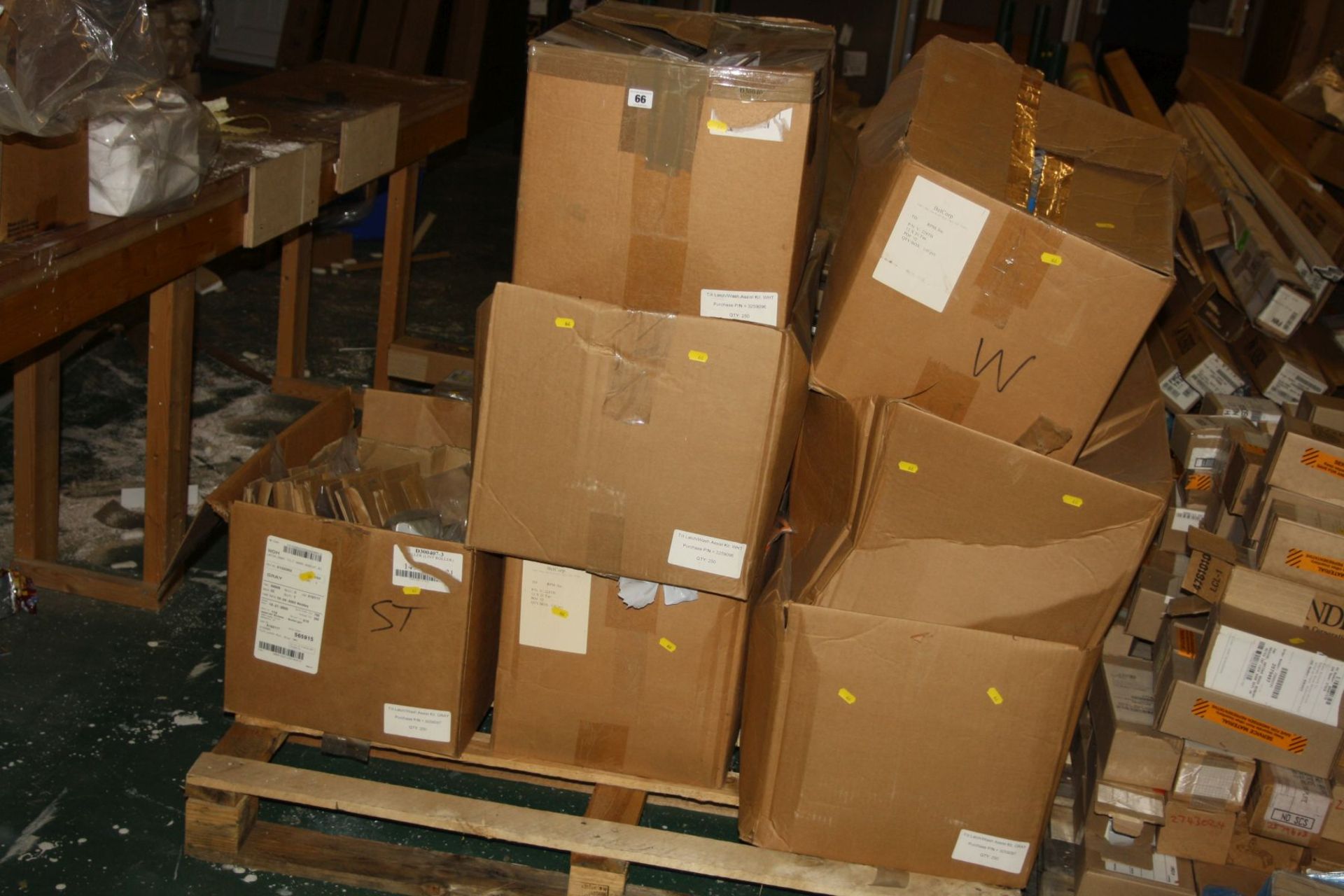 A PALLET OF HINGES, CAPS, ASSIST KITS etc