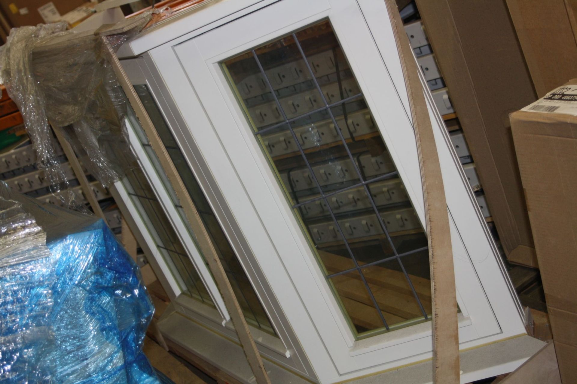 A WHITE PAINTED WOOD BAY WINDOW, with 3 opening panels 175cm wide 100cm high and 45cm deep