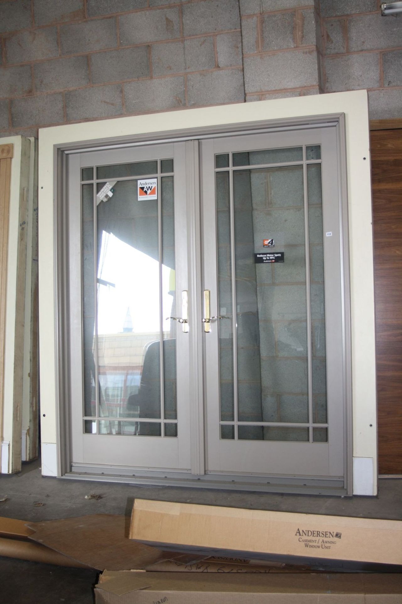 A TERRATONE AND OAK DOUBLE PATIO DOOR IN FRAME 210x181cm mounted in a show frame ( not in