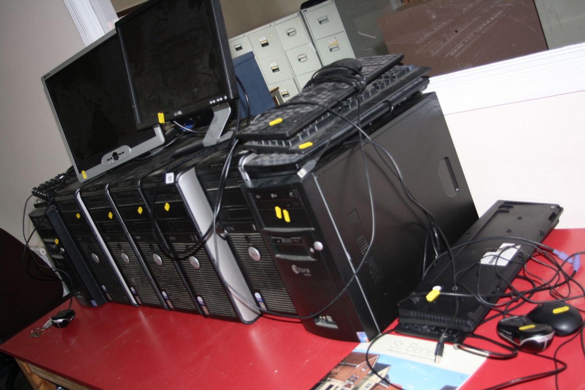 SEVEN DELL COMPUTER TOWERS, two screens, keyboards and mice