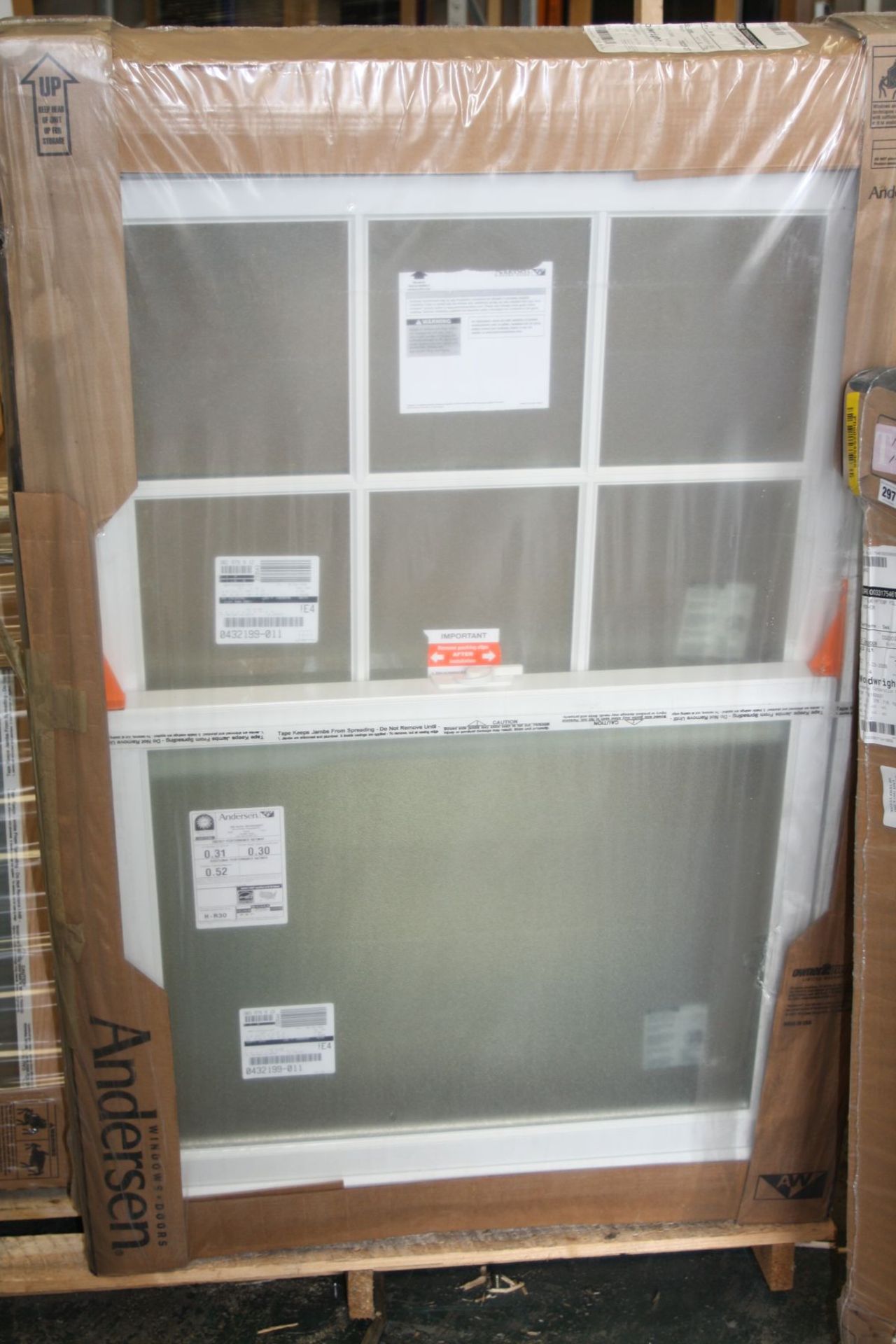 A BOXED WOODWRIGHT DOUBLE HUNG WINDOW UNIT, in white, pack stated dimensions 33 5/8'x52 7/8